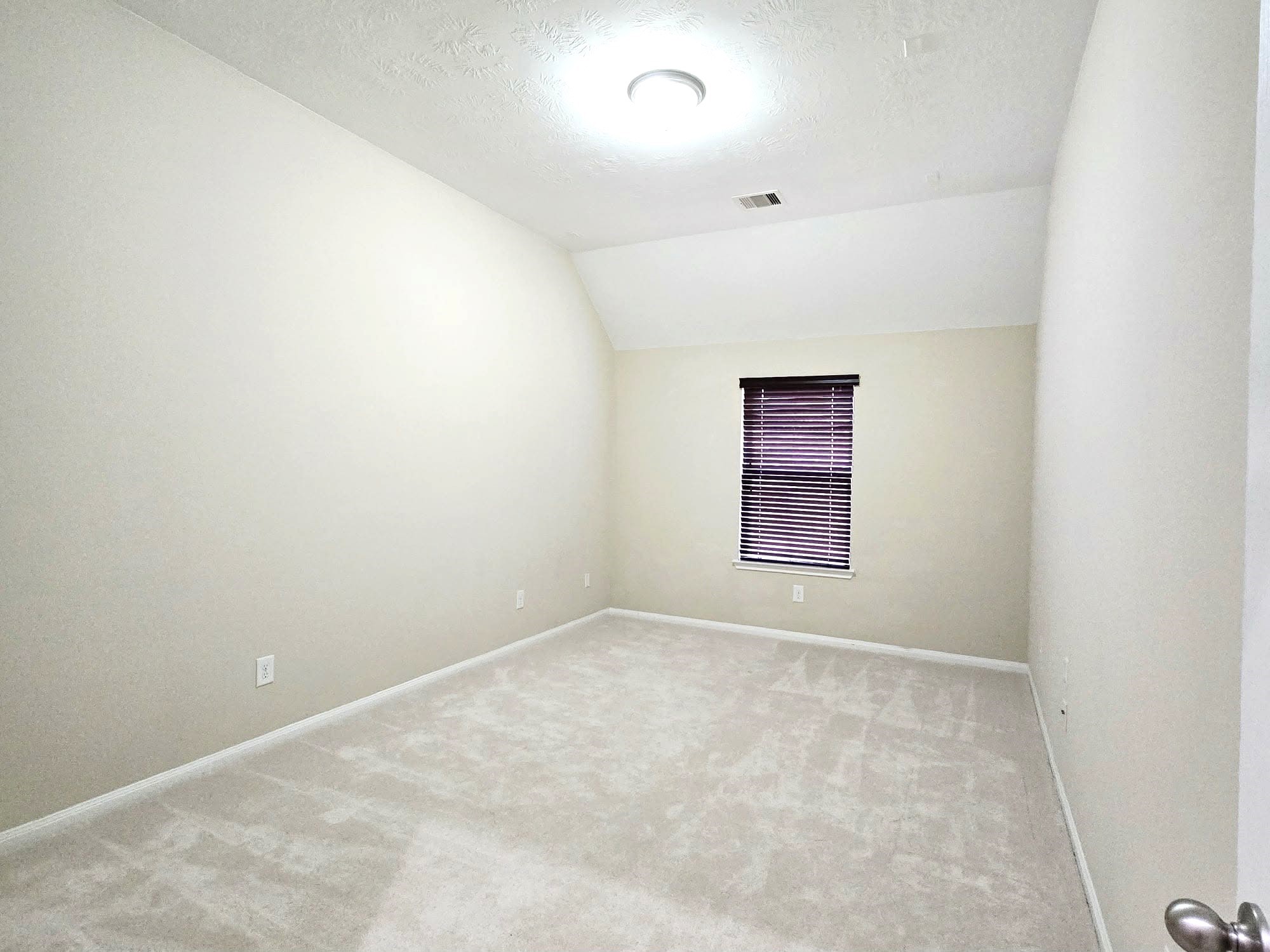 14015 Hailey Springs Lane Humble, TX 77396 - Photo 9 of 34 an empty room with windows