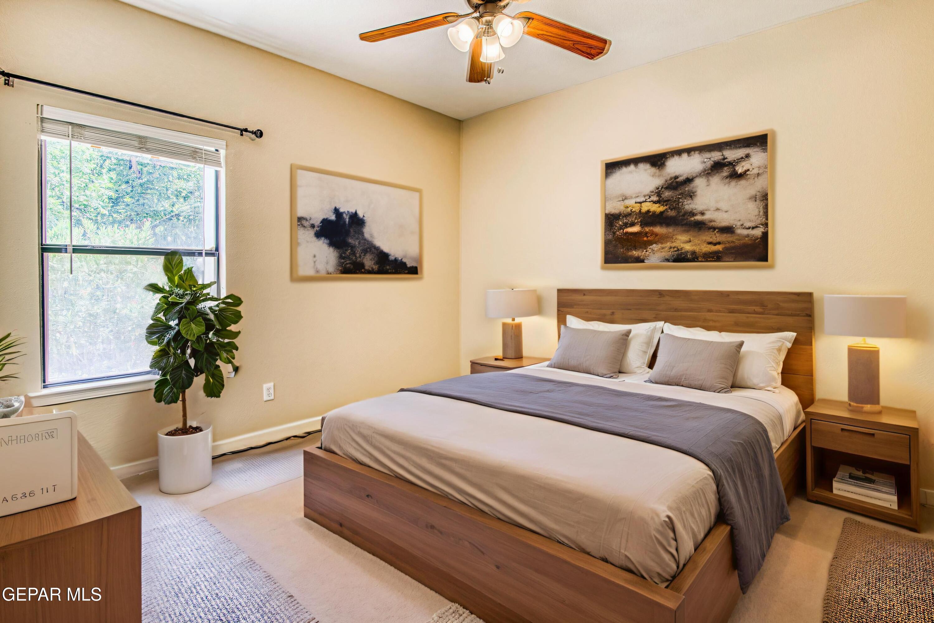 617 Wallace Road Anthony, NM 88021 - Photo 48 of 87 a bedroom with bed and a painting on the wall