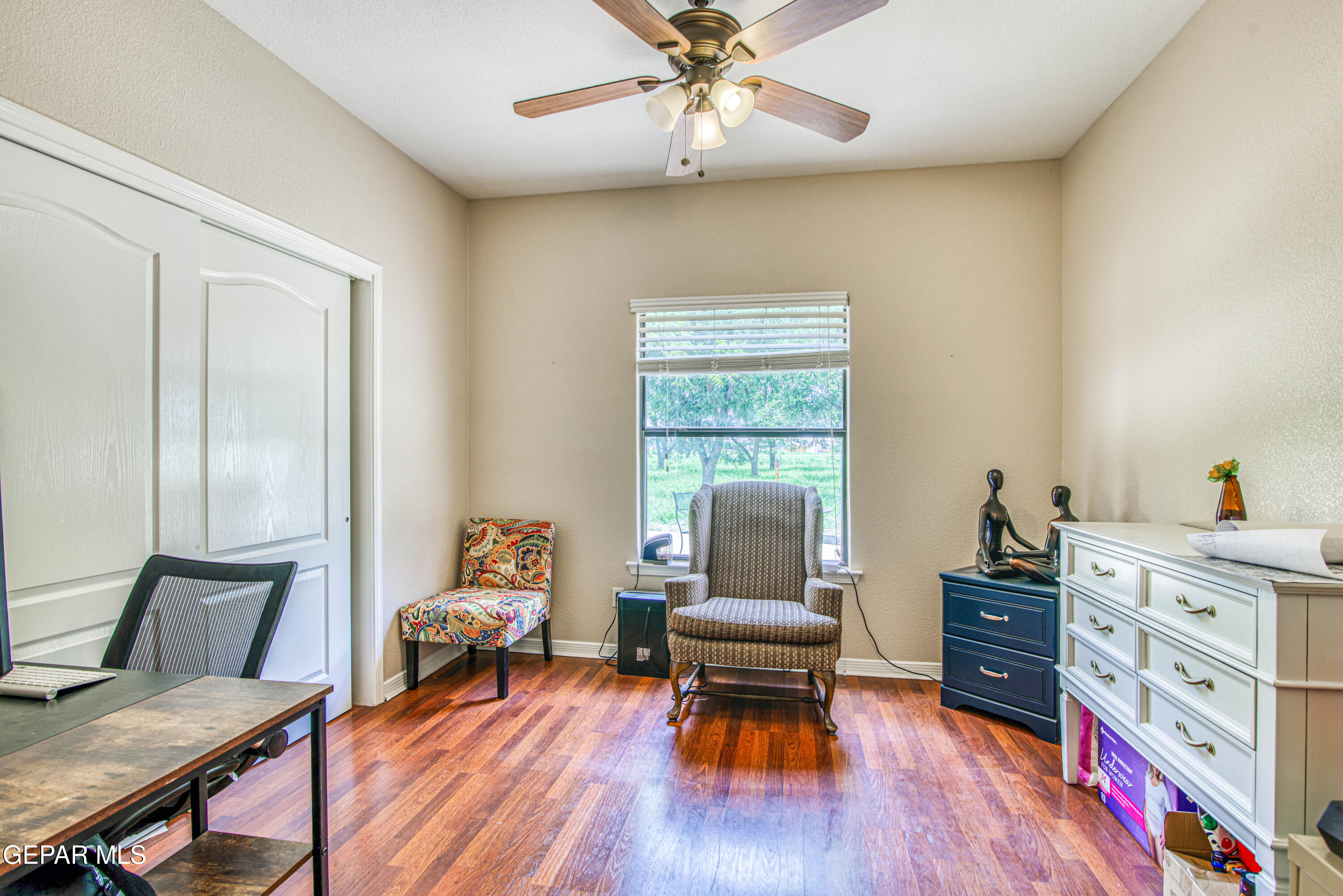 617 Wallace Road Anthony, NM 88021 - Photo 52 of 87 a living room with furniture and wooden floor