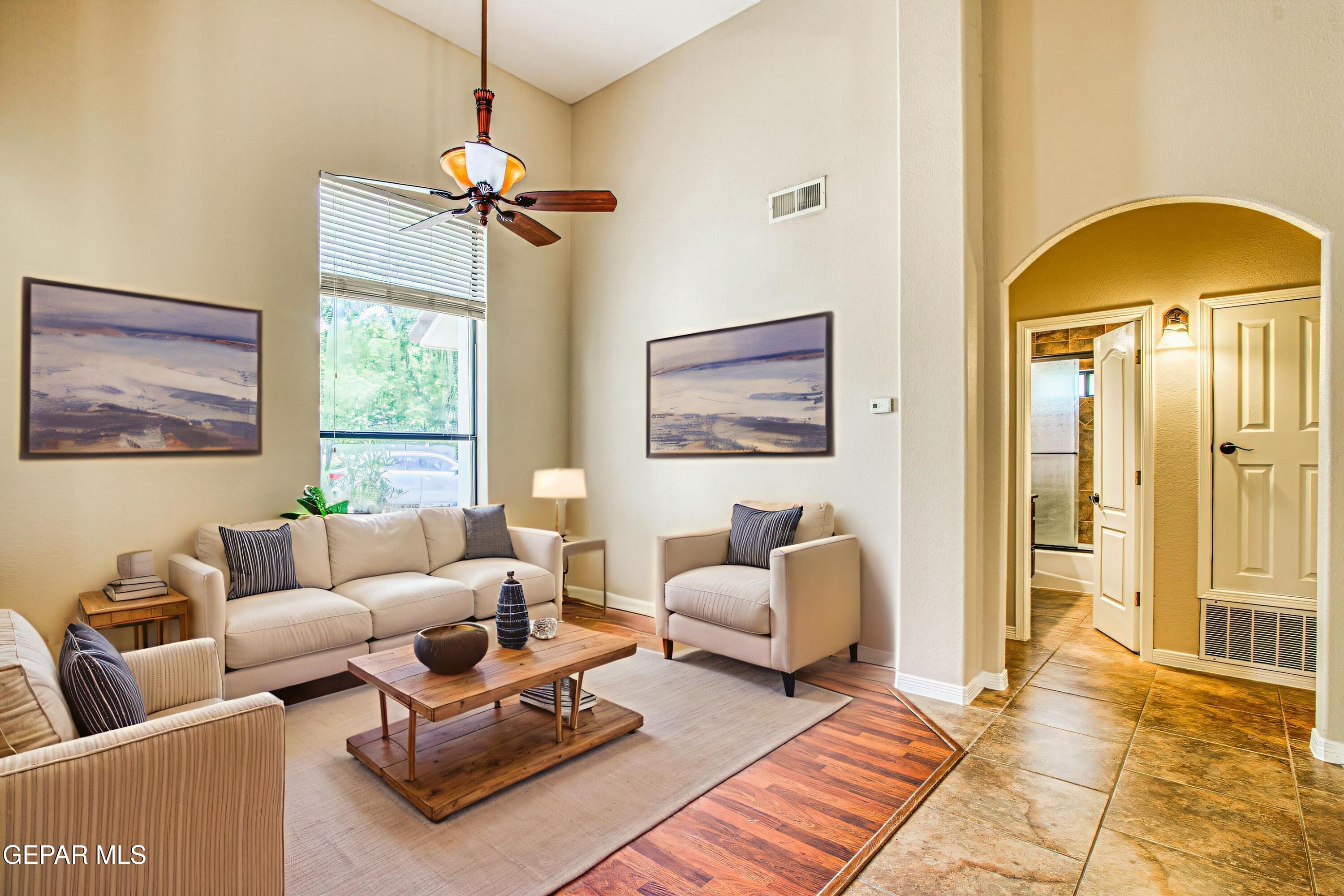 617 Wallace Road Anthony, NM 88021 - Photo 6 of 87 a living room with furniture a couch and a chandelier