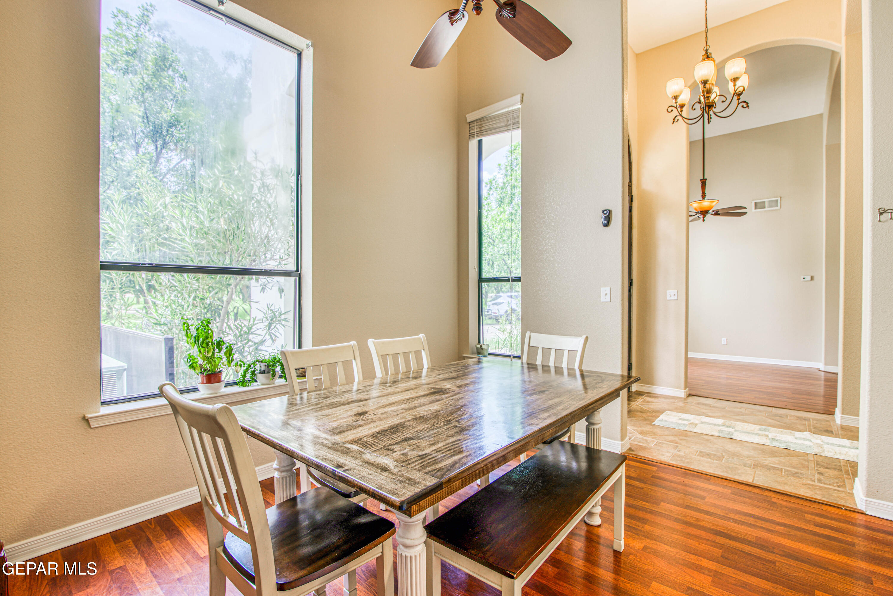 617 Wallace Road Anthony, NM 88021 - Photo 9 of 87 a view of a dining room with furniture window and wooden floor