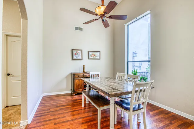 a view of a dining room with furniture
