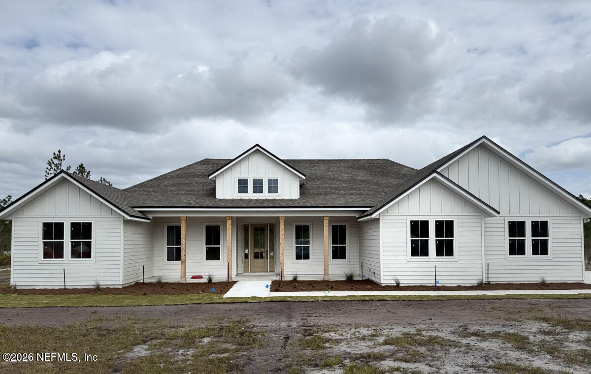 8655 Odis Yarborough Road Glen St. Mary, FL 32040 - Photo 1 of 1 a front view of a house with a yard