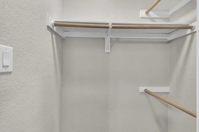 a view of a room with racks on the wall