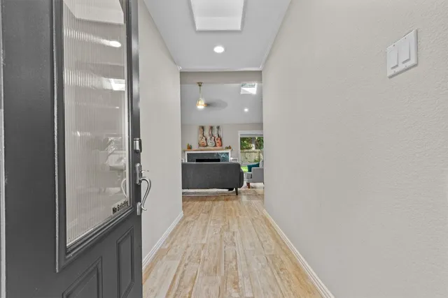 a view of a kitchen from the hallway