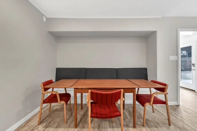 a table and chairs in a room