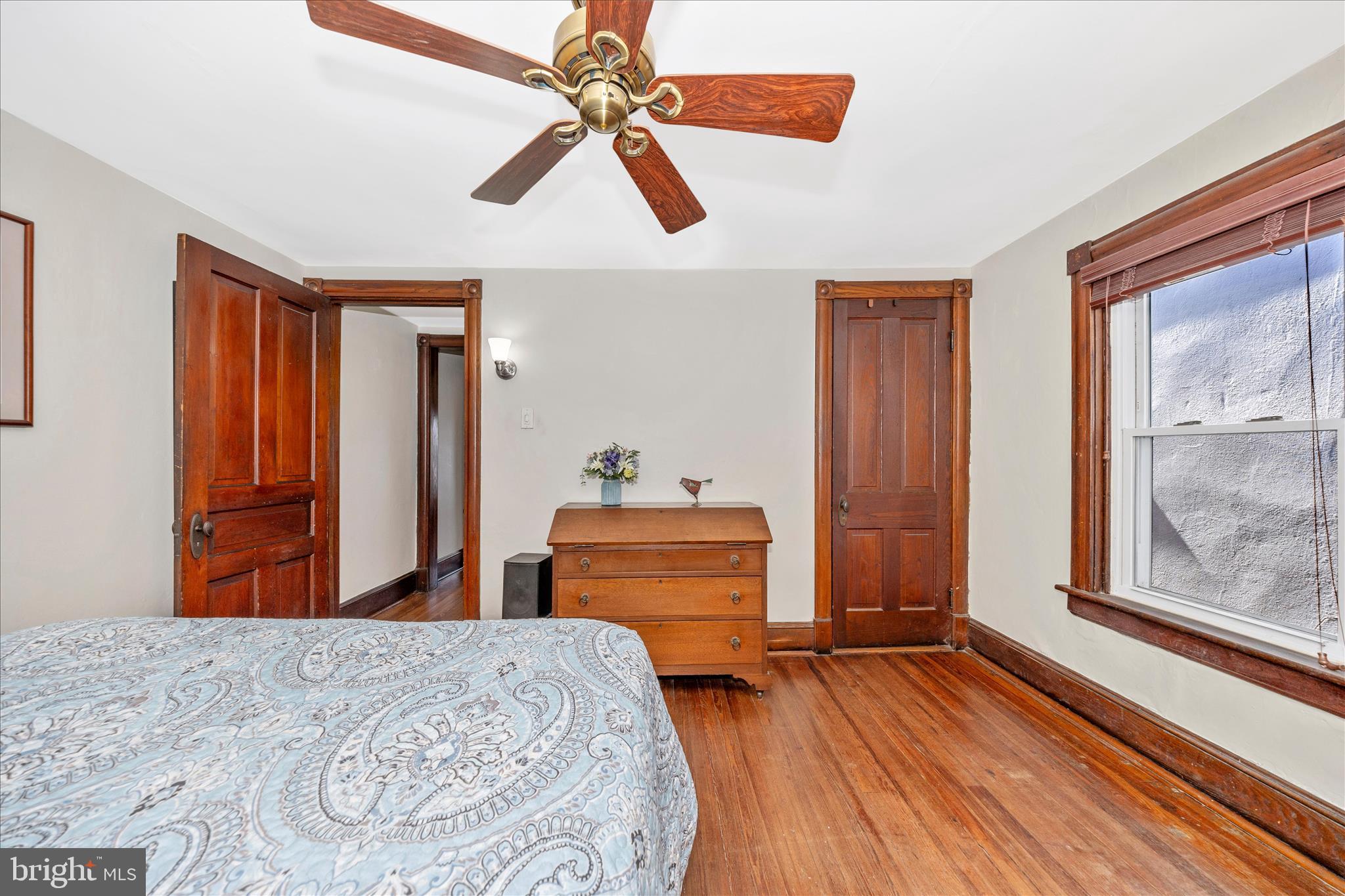 24 East 8th Street Frederick, MD 21701 - Photo 26 of 51 a bedroom with a bed and wooden floor