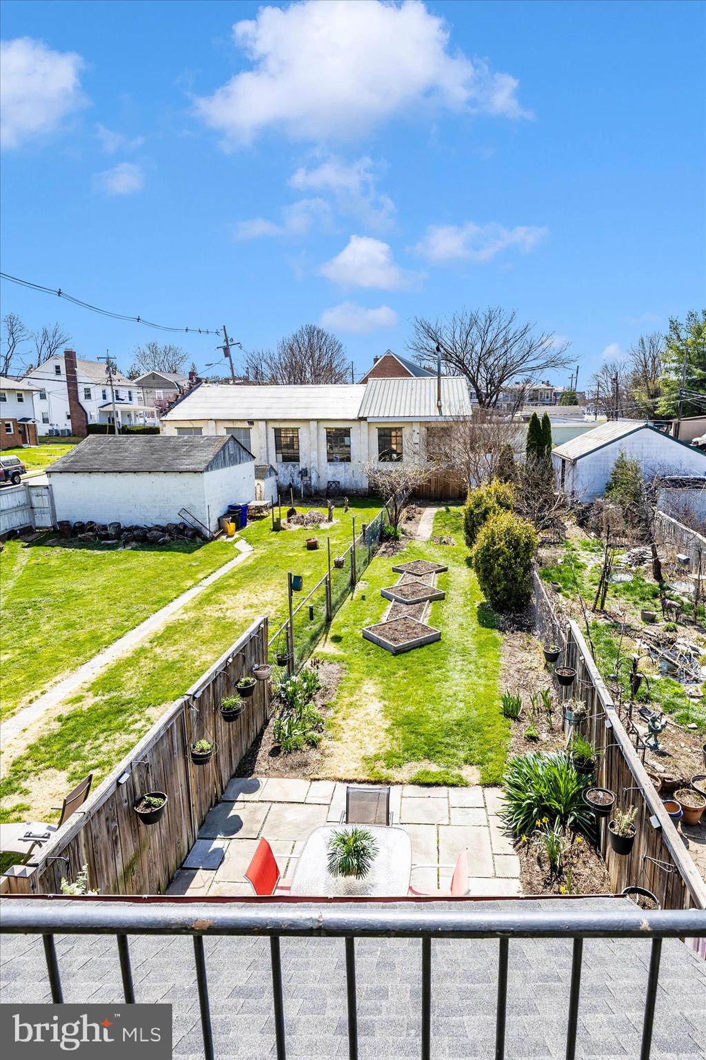 24 East 8th Street Frederick, MD 21701 - Photo 45 of 51 a view of a swimming pool with a lawn chairs and potted plants