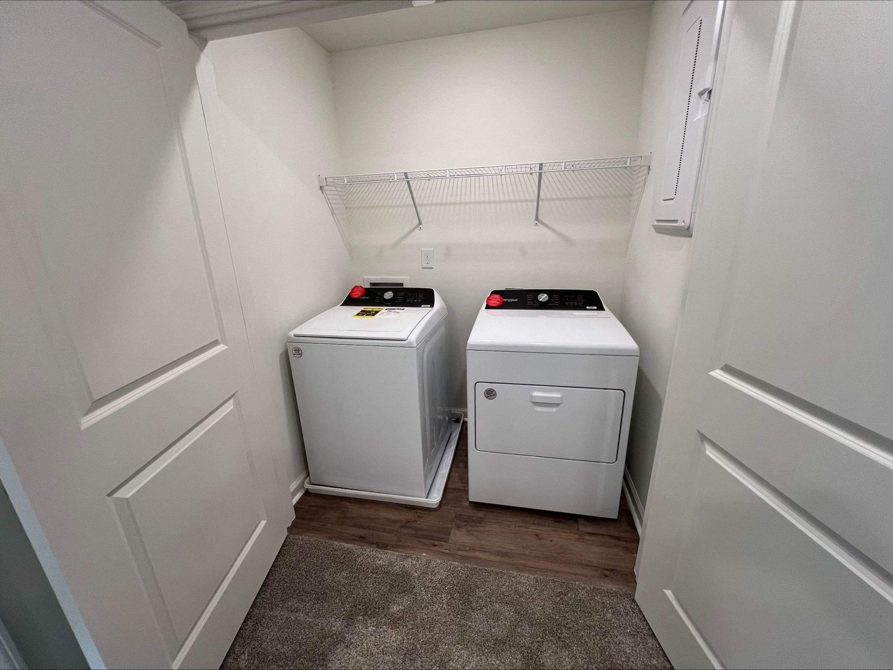 3060 Spline Circle Raleigh, NC 27610 - Photo 8 of 14 a utility room with dryer and washer