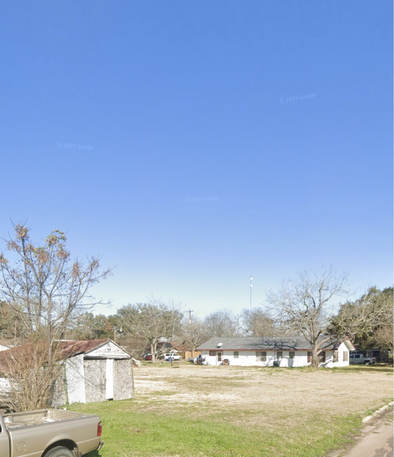 906 Rice Street Hempstead, TX 77445 - Photo 7 of 10 a view of lake with residential houses