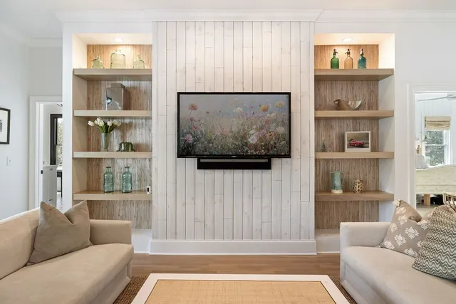 a stove top oven sitting inside of a kitchen