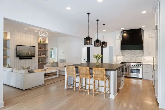 a kitchen with a table and chairs in it
