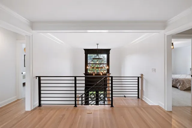 a bedroom with furniture and window