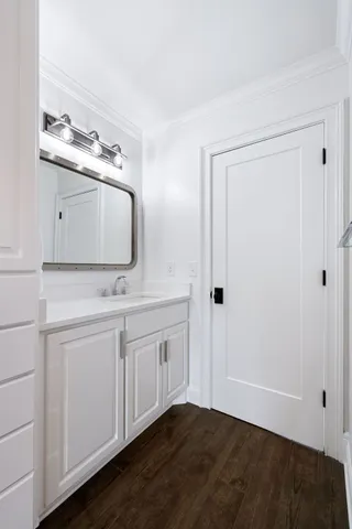 an aerial view of a house with yard