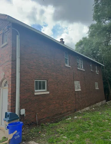 a bathroom with a sink a toilet and bathtub