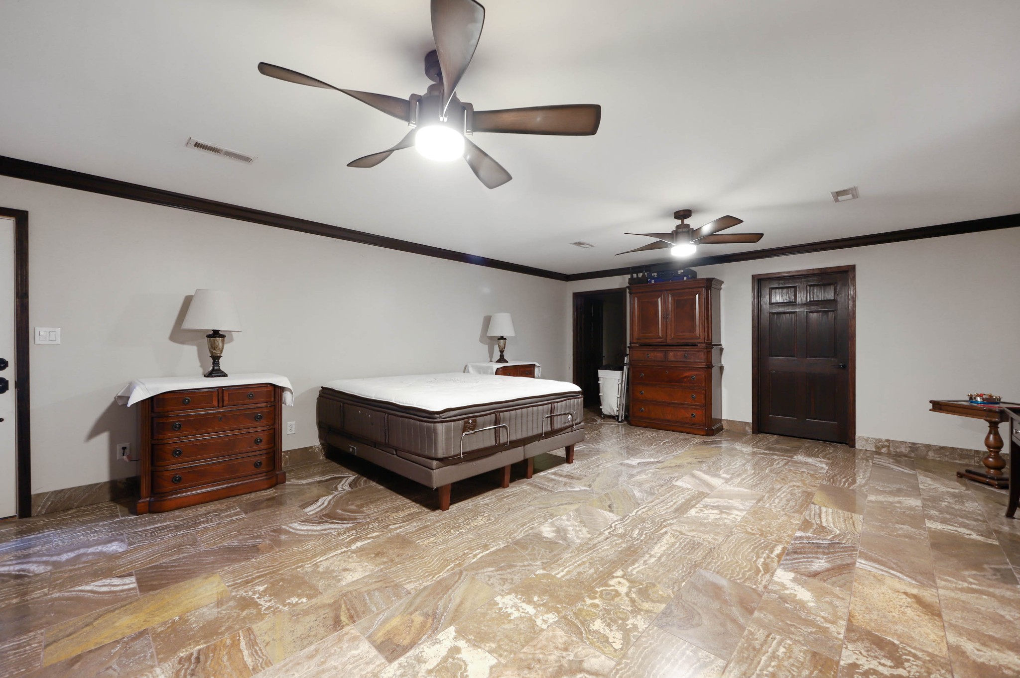 832 Jones Creek Road Dickson, TN 37055 - Photo 13 of 53 a spacious bedroom with a bed and a chandelier