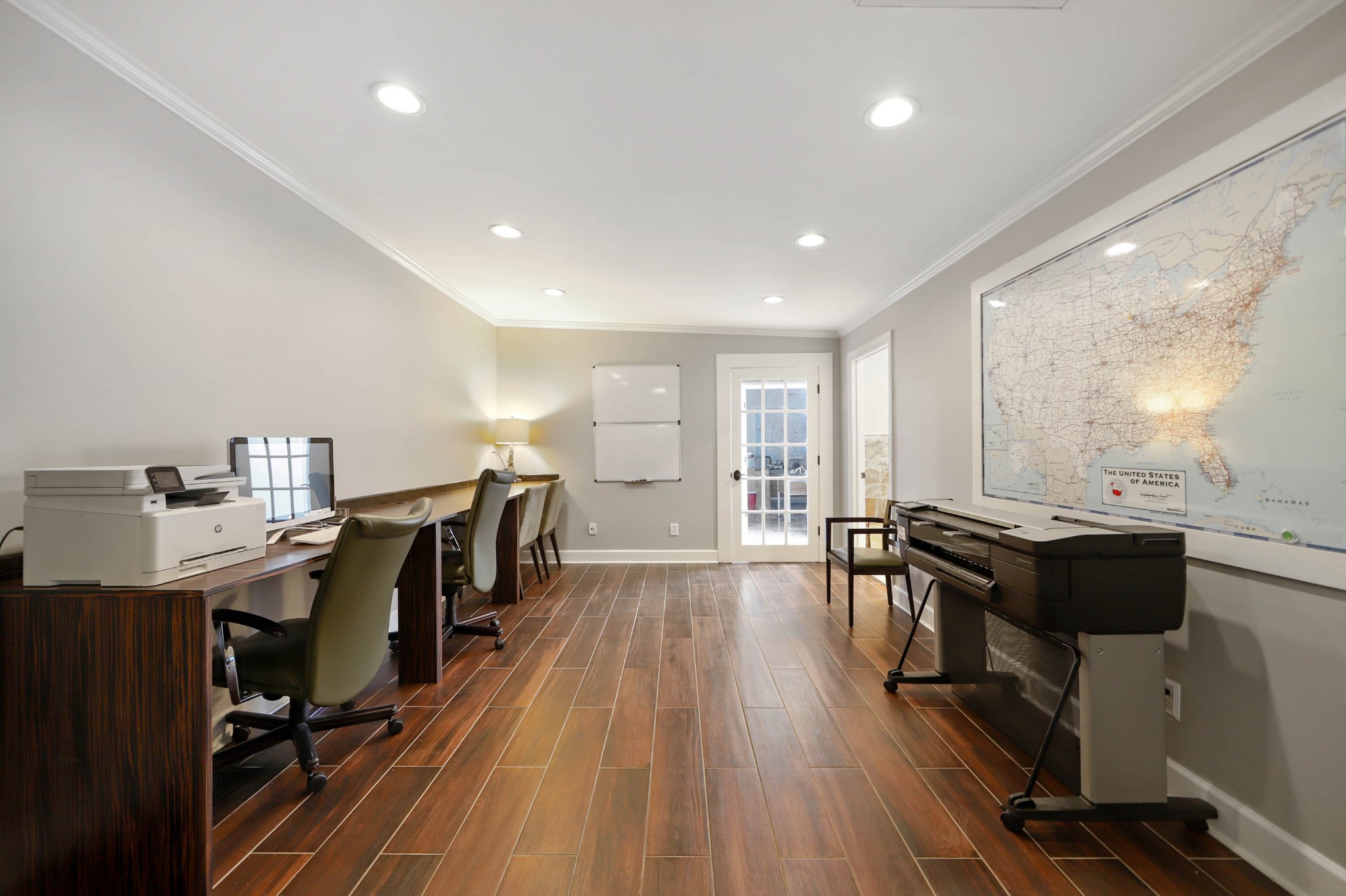 832 Jones Creek Road Dickson, TN 37055 - Photo 17 of 53 a view of a workspace with furniture and a large window