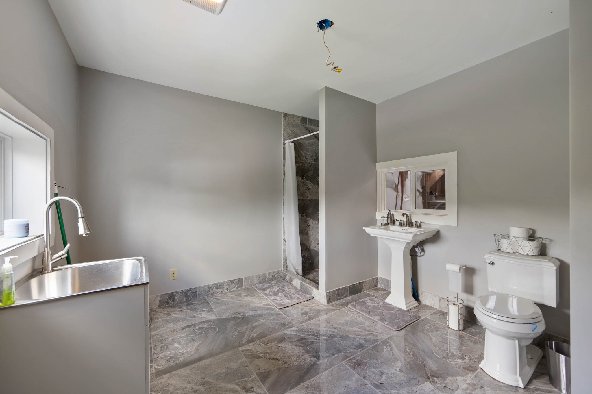 832 Jones Creek Road Dickson, TN 37055 - Photo 28 of 53 a bathroom with a toilet sink and mirror