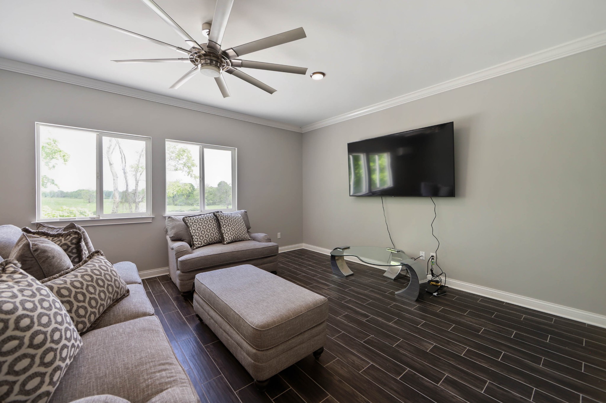 832 Jones Creek Road Dickson, TN 37055 - Photo 29 of 53 a living room with furniture and a flat screen tv