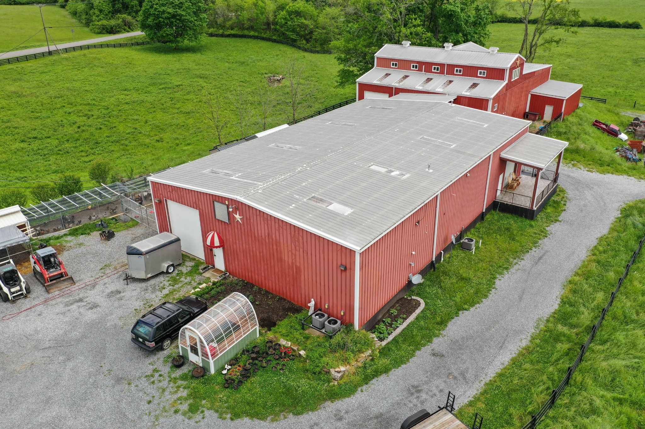 832 Jones Creek Road Dickson, TN 37055 - Photo 3 of 53 a view of a backyard with table and chairs plants and large trees
