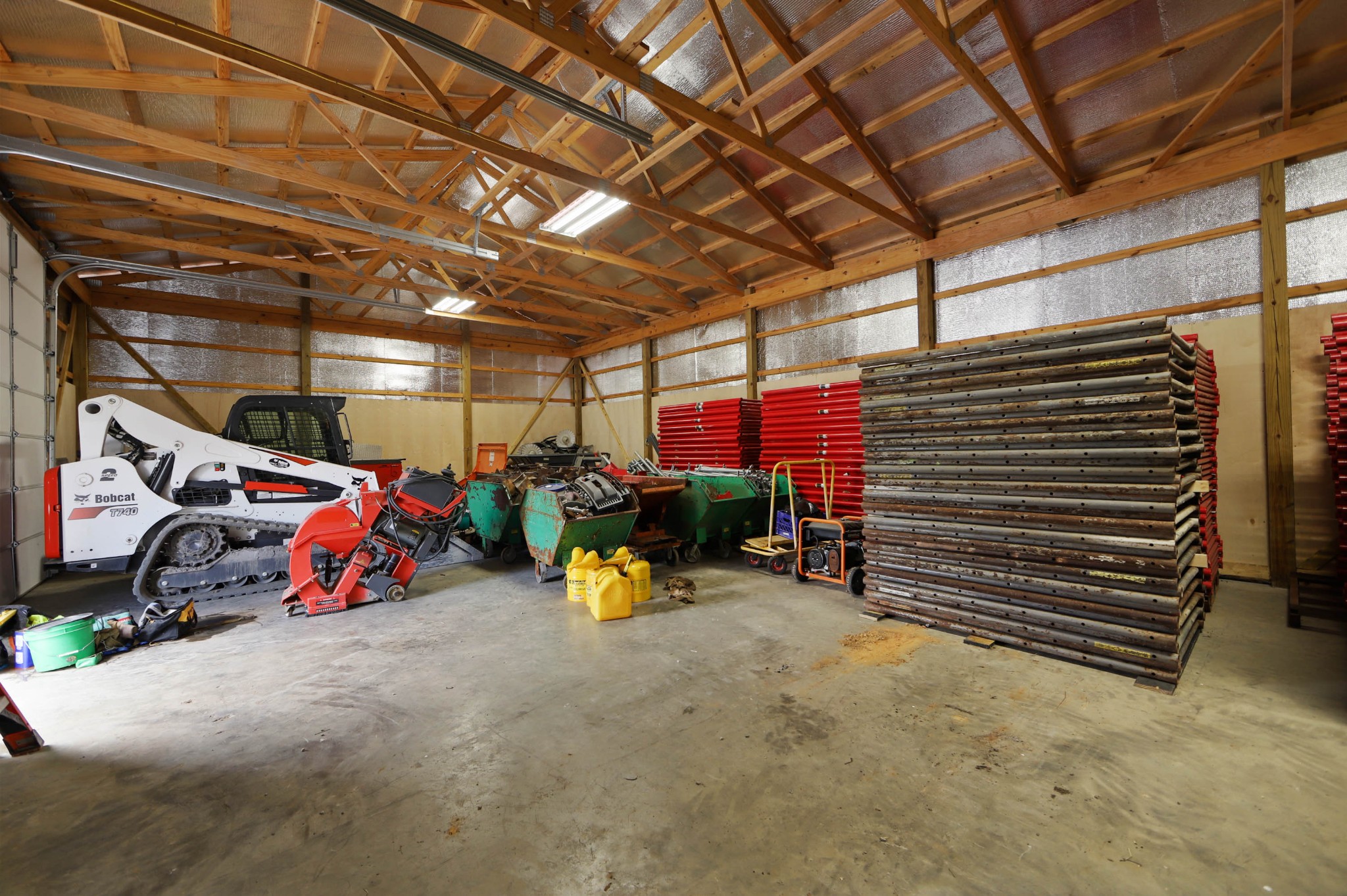 832 Jones Creek Road Dickson, TN 37055 - Photo 31 of 53 a view of a garage with parked cars