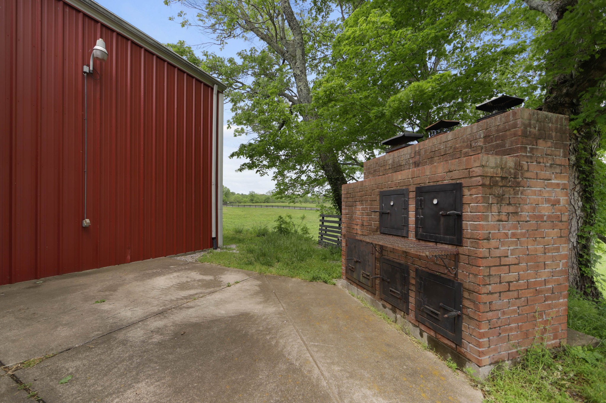 832 Jones Creek Road Dickson, TN 37055 - Photo 32 of 53 a backyard of a house with lots of green space