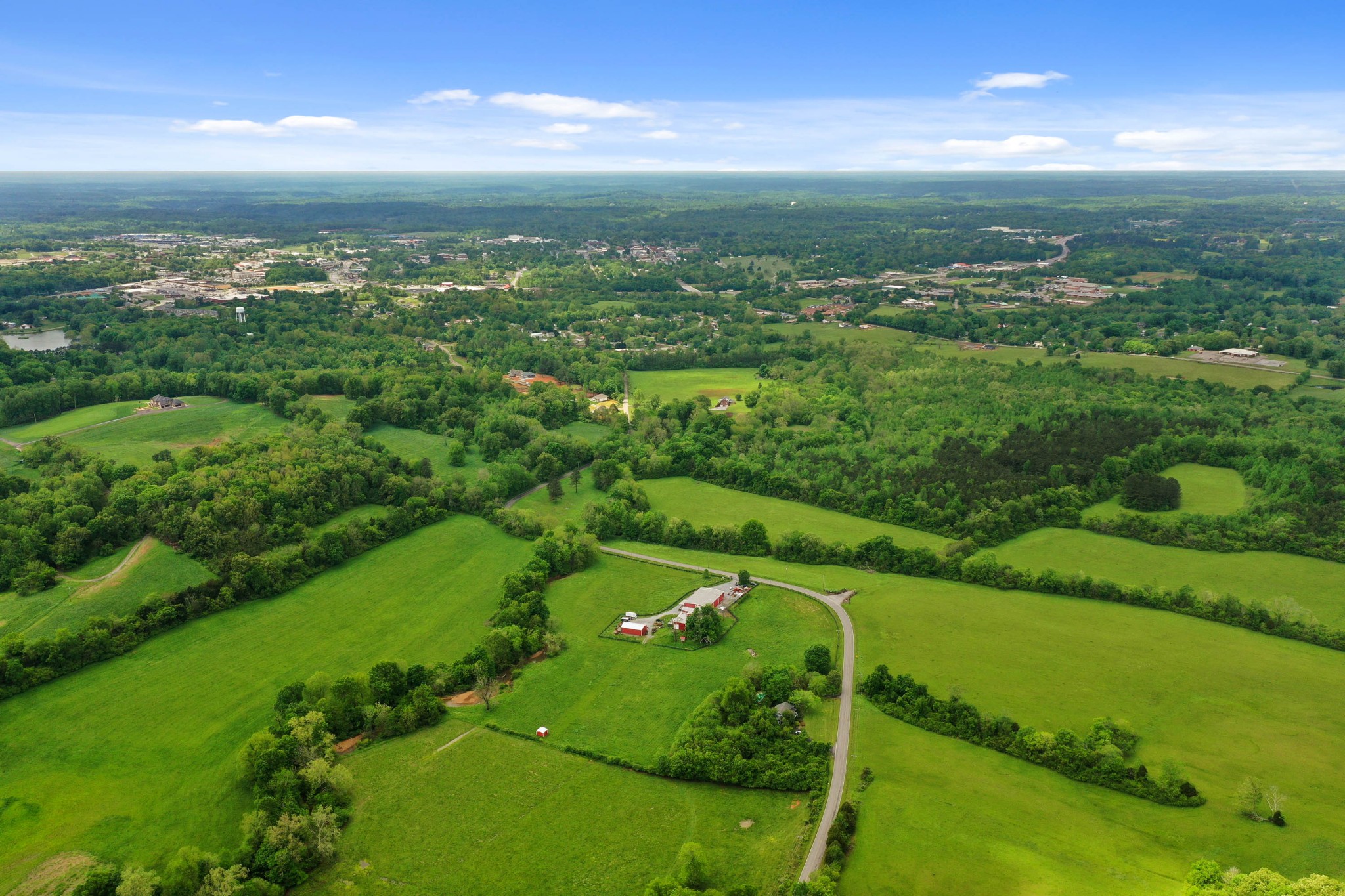 832 Jones Creek Road Dickson, TN 37055 - Photo 40 of 53 a view of a city with lush green forest