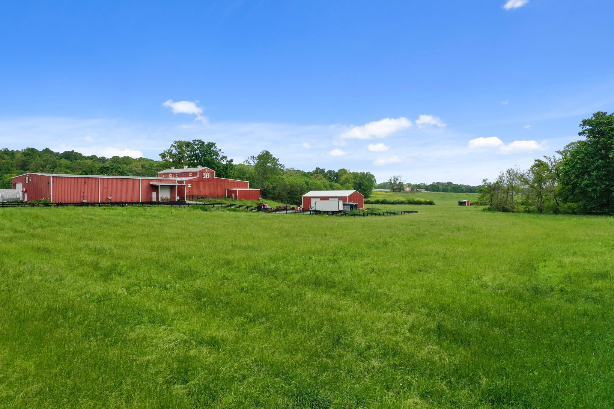 832 Jones Creek Road Dickson, TN 37055 - Photo 4 of 53 a view of a field of grass and trees