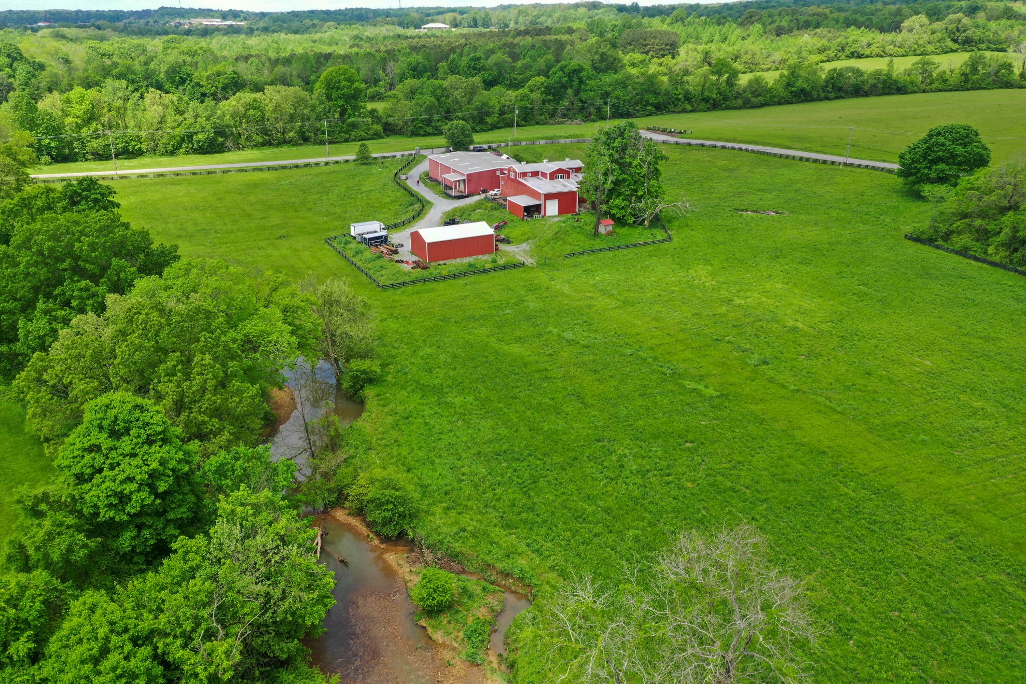 832 Jones Creek Road Dickson, TN 37055 - Photo 50 of 53 a view of a golf course with chairs and a table