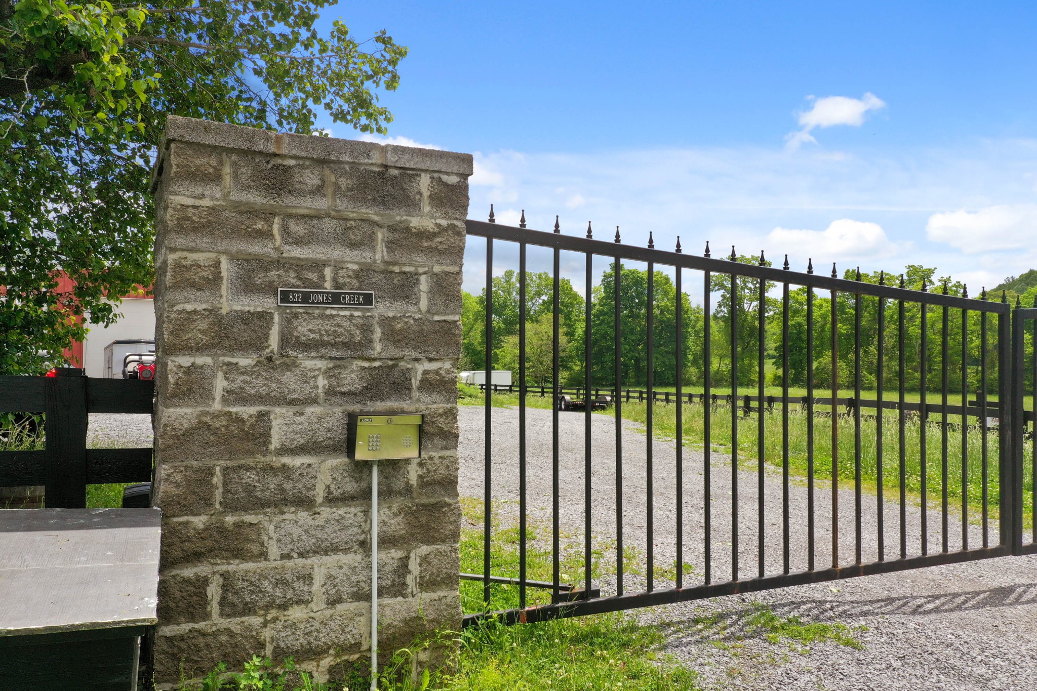 832 Jones Creek Road Dickson, TN 37055 - Photo 8 of 53 a view of a brick house with a large window