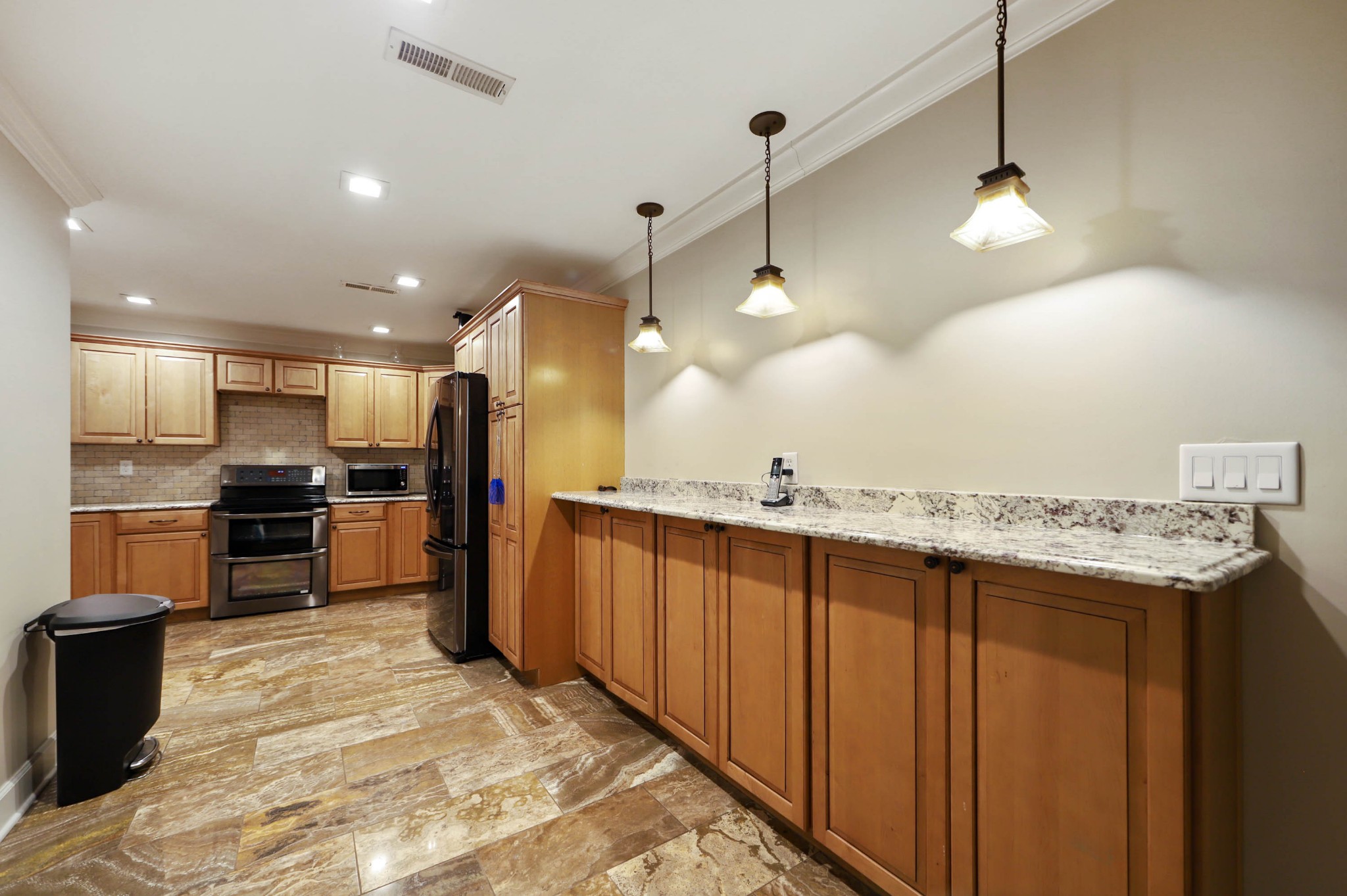 832 Jones Creek Road Dickson, TN 37055 - Photo 10 of 53 a kitchen with kitchen island a sink stainless steel appliances and cabinets