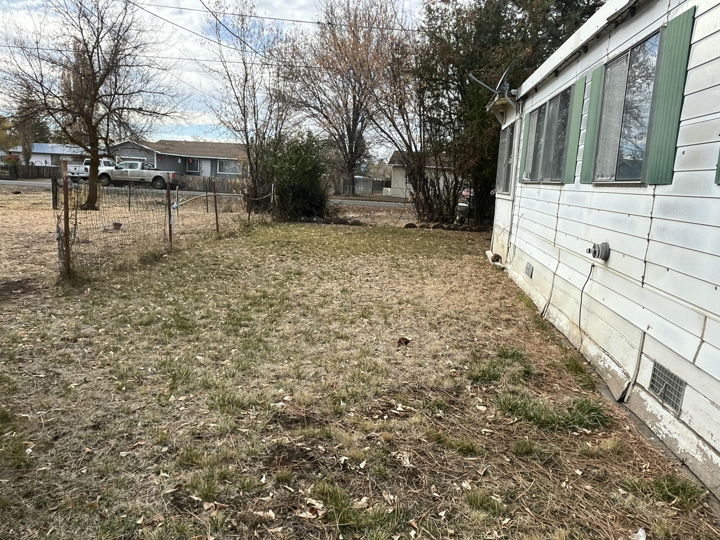 305 Punkin Center Road Bieber, CA 96009 - Photo 6 of 6 a view of a yard with wooden fence