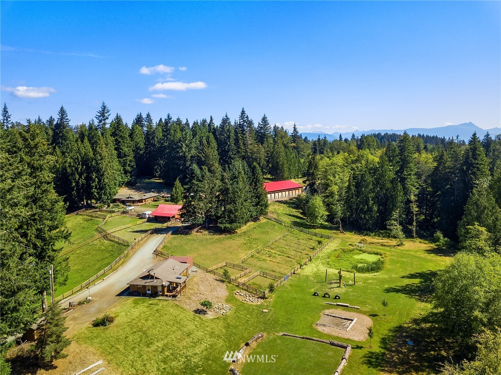 12105 Ingraham Road Snohomish, WA 98290 - Photo 1 of 30 a view of swimming pool is middle in the garden