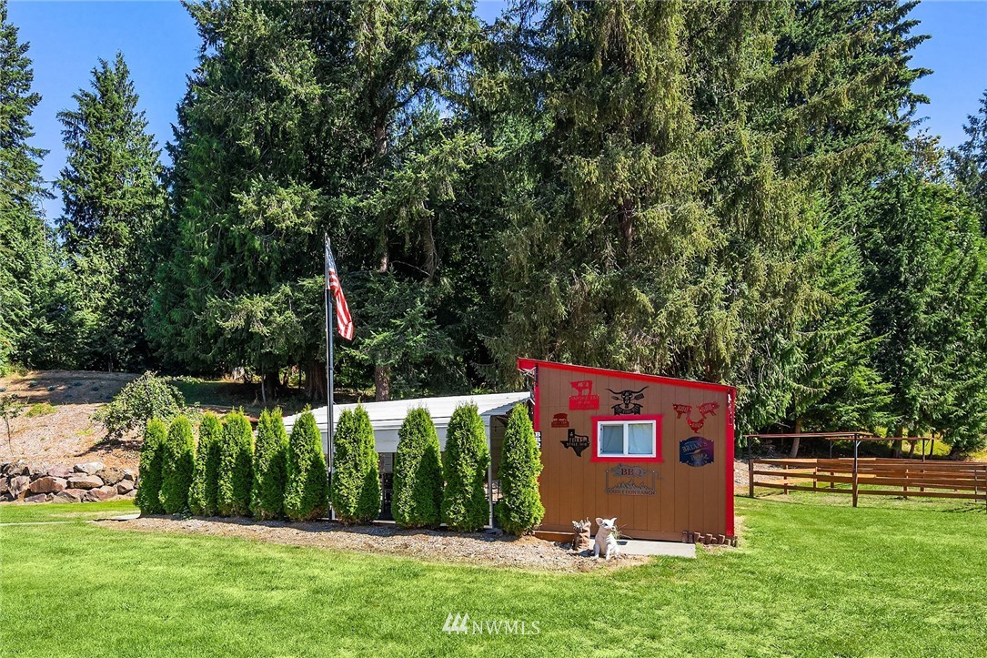 12105 Ingraham Road Snohomish, WA 98290 - Photo 29 of 30 a front view of a house with garden