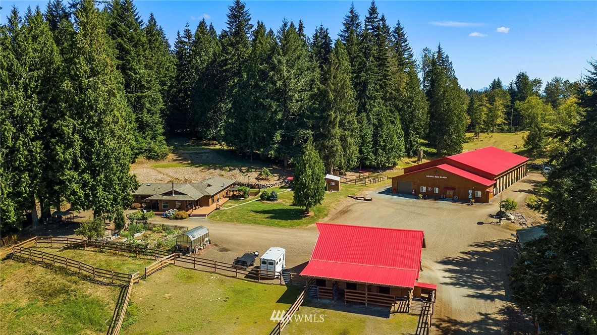 12105 Ingraham Road Snohomish, WA 98290 - Photo 5 of 30 an aerial view of a swimming pool with outdoor seating
