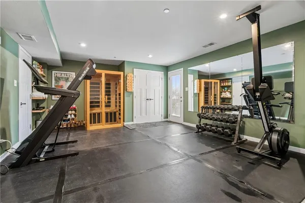 a view of a room with gym equipment