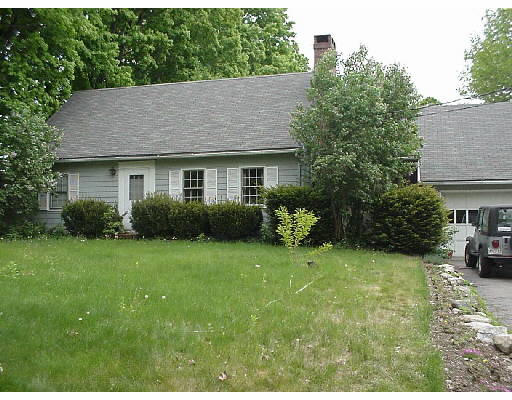343 Montague Road Amherst, MA 01002 - Photo 1 of 1 a view of a house with garden and yard