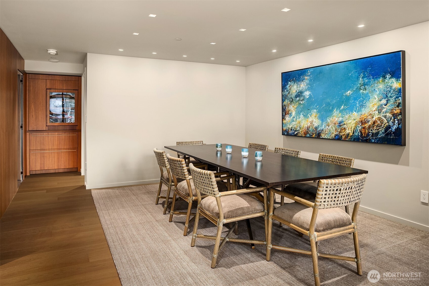 80 Vine Street, Unit 2600 Seattle, WA 98121 - Photo 12 of 40 a view of a dining room with furniture and wooden floor