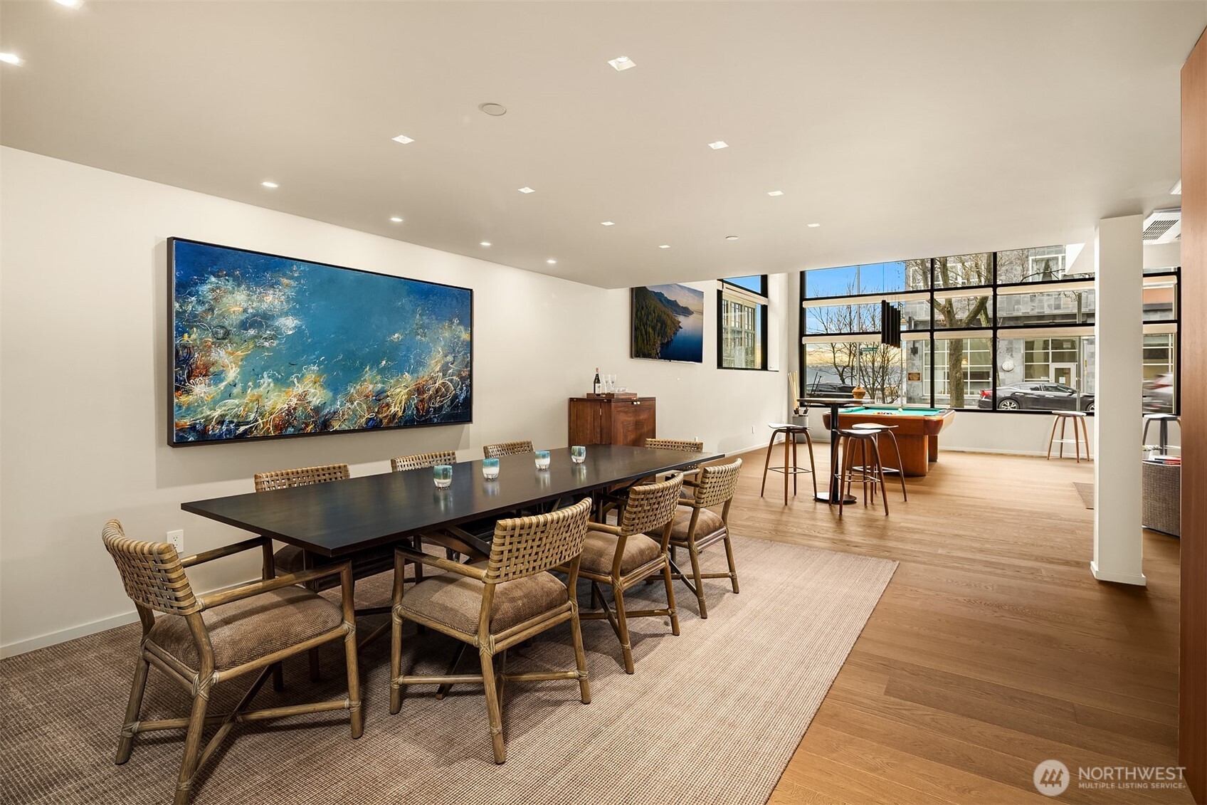 80 Vine Street, Unit 2600 Seattle, WA 98121 - Photo 14 of 40 a dining room with furniture and wooden floor