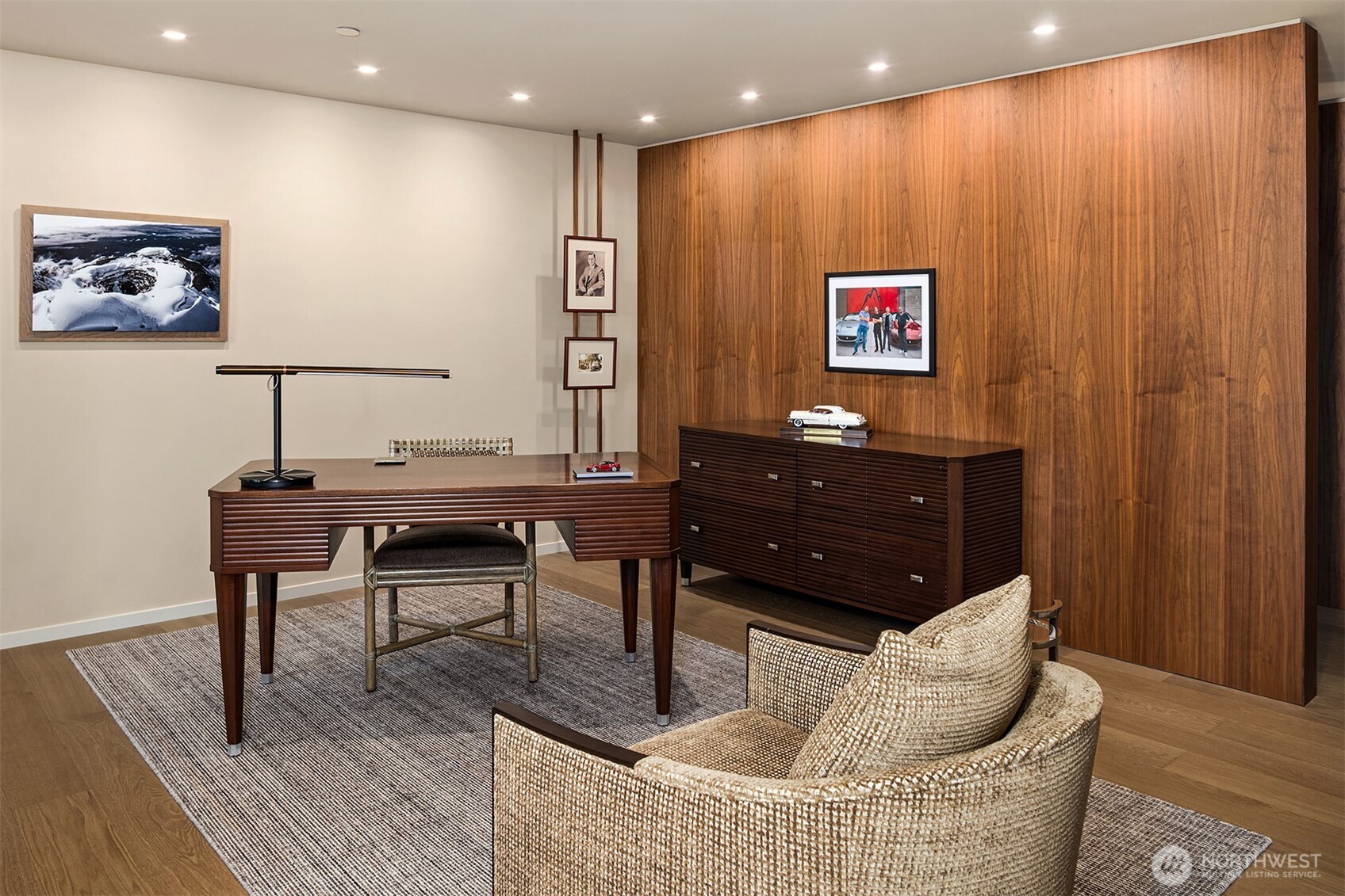 80 Vine Street, Unit 2600 Seattle, WA 98121 - Photo 4 of 40 a living room with couch and a dining table with wooden floor