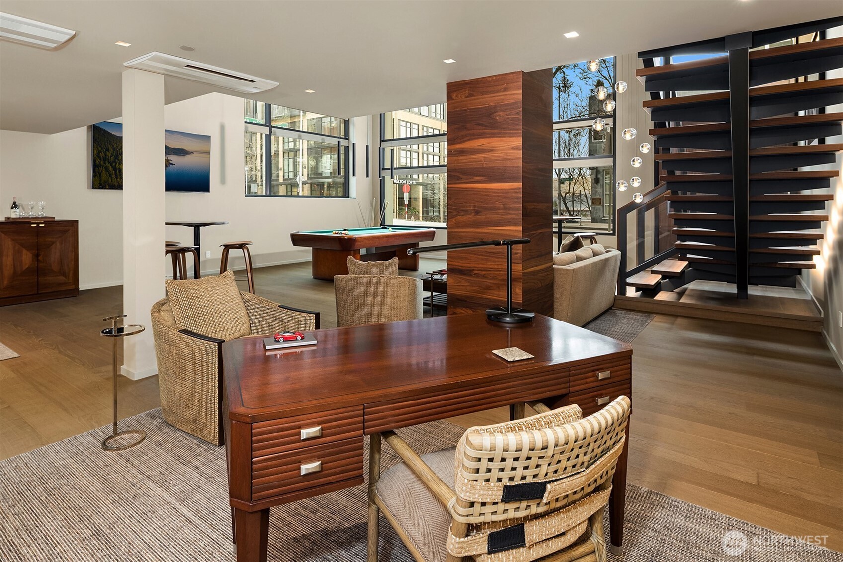 80 Vine Street, Unit 2600 Seattle, WA 98121 - Photo 5 of 40 a living room with furniture and a flat screen tv