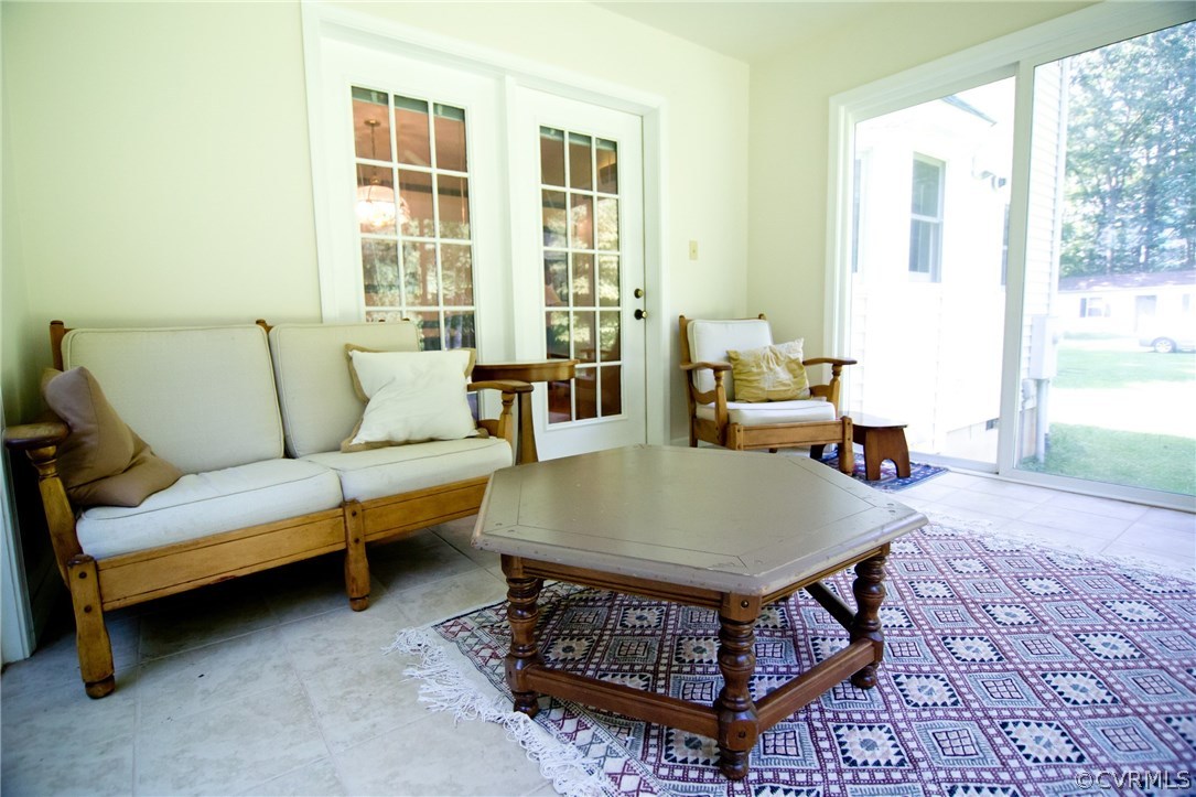 1343 Old Ridge Road Farmville, VA 23901 - Photo 12 of 31 a living room with furniture a table and a large window