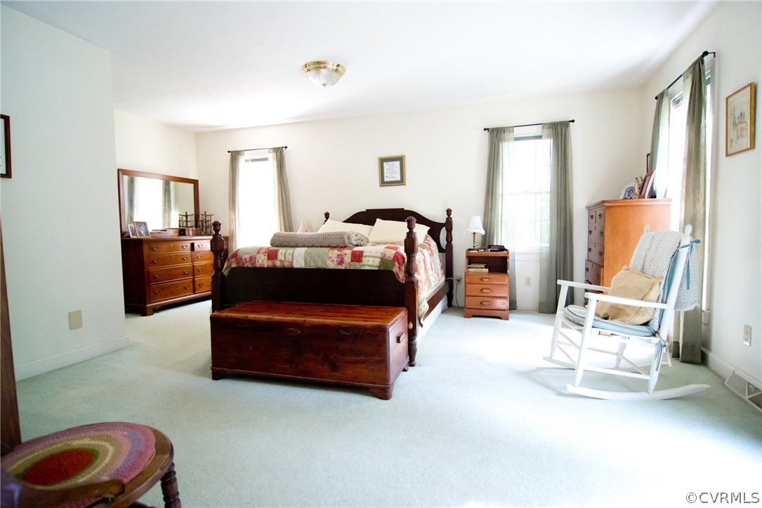 1343 Old Ridge Road Farmville, VA 23901 - Photo 17 of 31 a bed room with furniture and a chair
