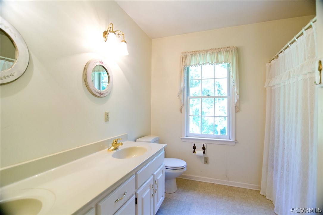 1343 Old Ridge Road Farmville, VA 23901 - Photo 23 of 31 a bathroom with a sink and a toilet