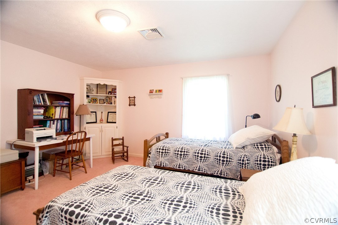 1343 Old Ridge Road Farmville, VA 23901 - Photo 26 of 31 a bedroom with a bed and a book shelf