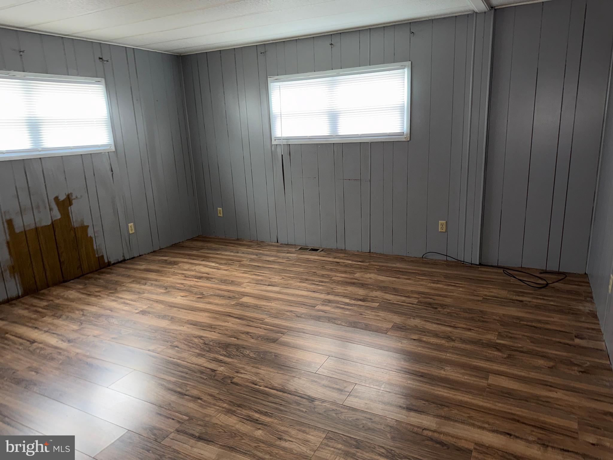 187 Rita Place Williamstown, NJ 08094 - Photo 19 of 20 a view of wooden floor and windows in a room