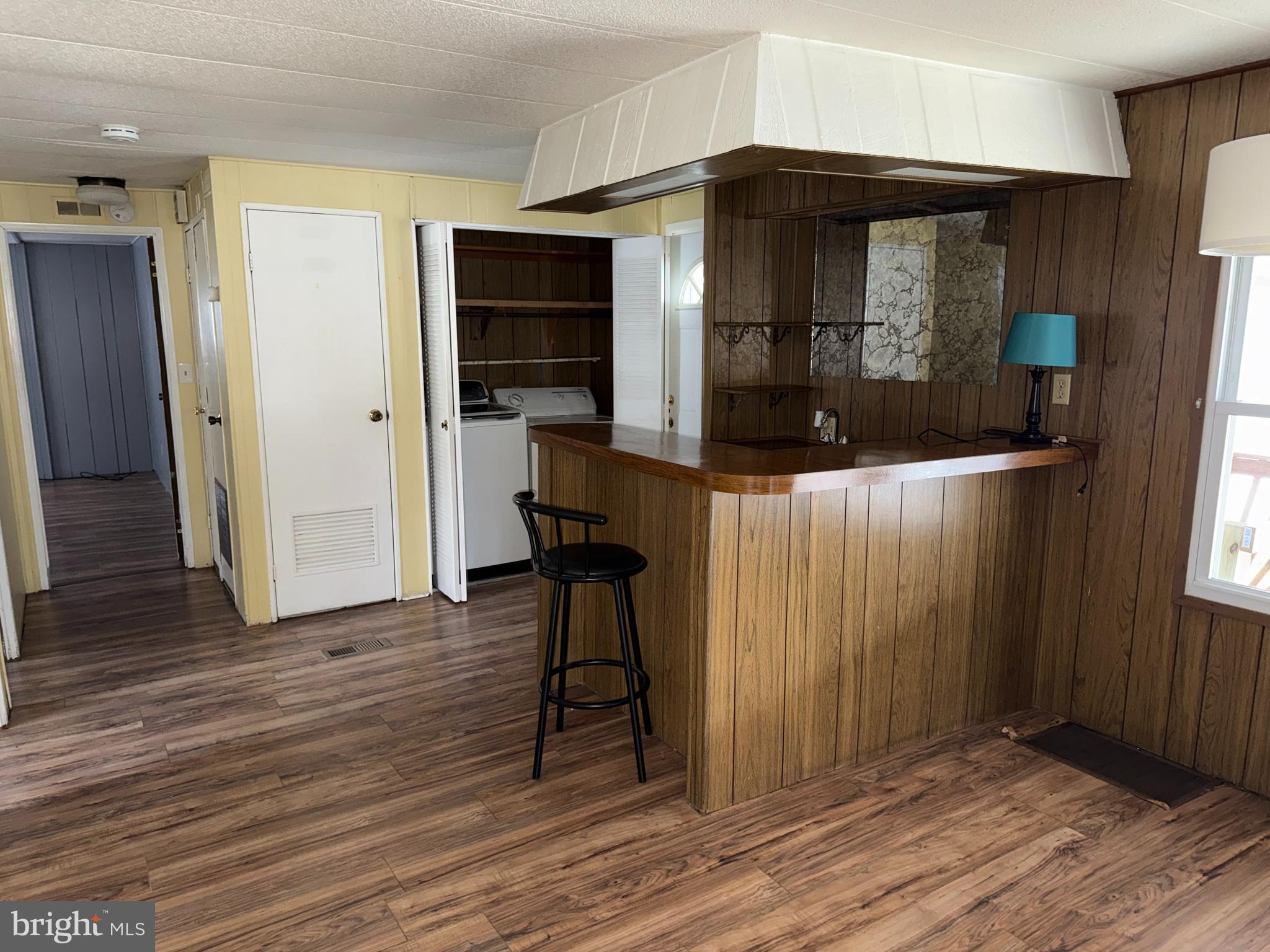 187 Rita Place Williamstown, NJ 08094 - Photo 6 of 20 a view of hallway with wooden floor and stairs