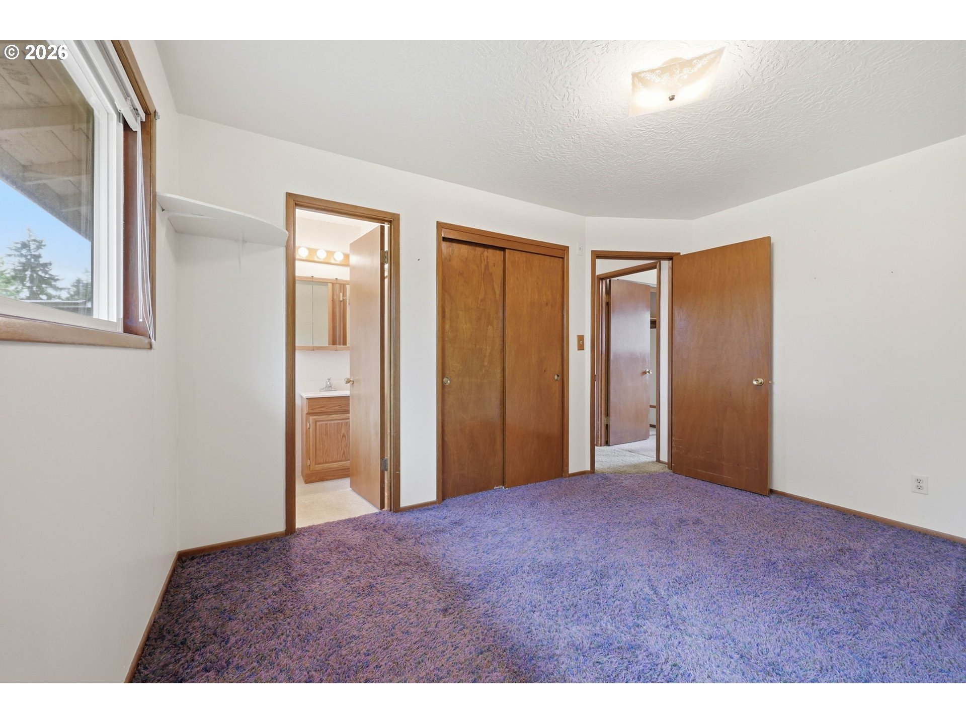 18925 Southwest Rosa Road Beaverton, OR 97078 - Photo 11 of 33 a view of an empty room with window and closet