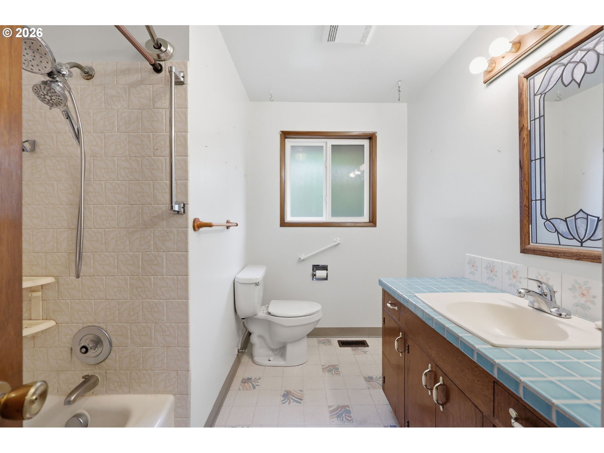 18925 Southwest Rosa Road Beaverton, OR 97078 - Photo 16 of 33 a bathroom with a granite countertop sink toilet and shower