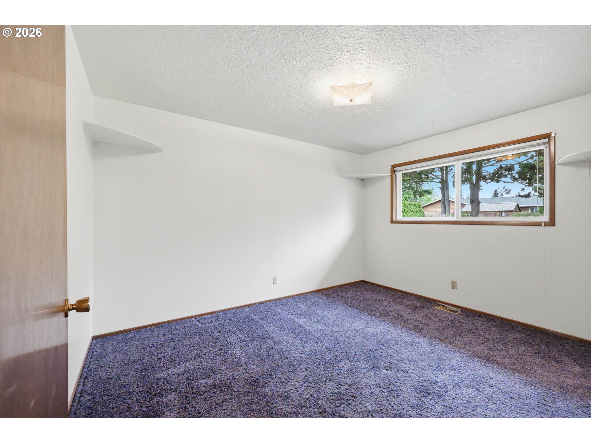 18925 Southwest Rosa Road Beaverton, OR 97078 - Photo 10 of 33 an empty room with windows
